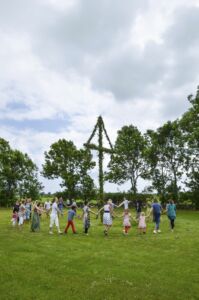 Dancing around the may pole