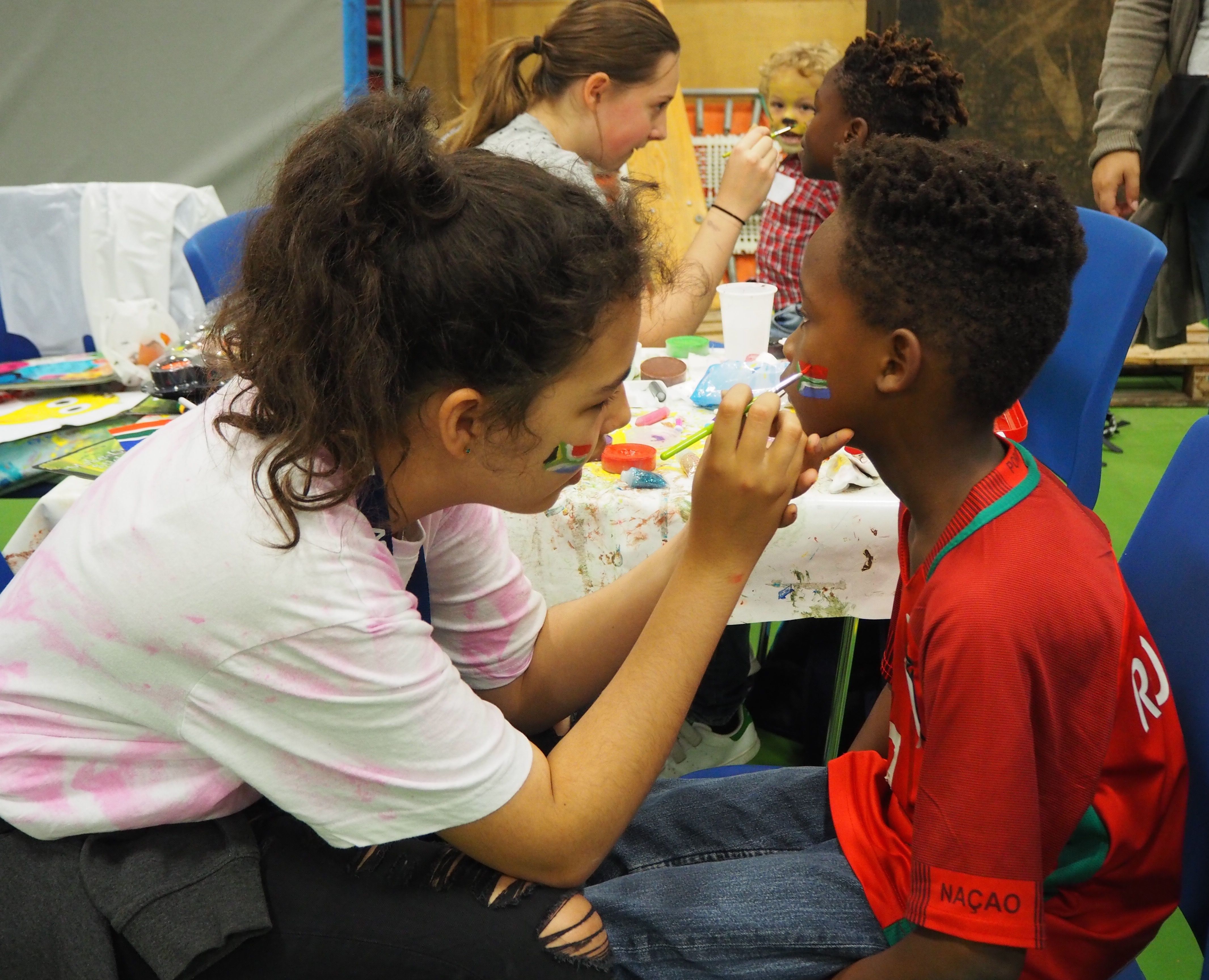 NGG International students face-painted kids at South African Embassy