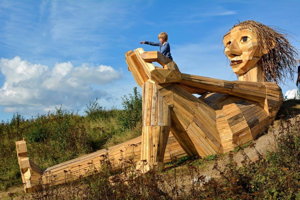 Giant wooden sculpture artist offers graffiti workshop to vandals of his work
