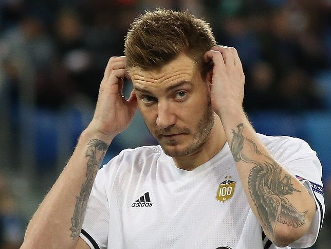 Bendtner among cuts as Denmark unveils final World Cup squad