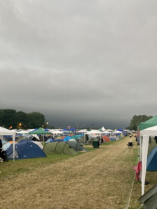 Roskilde 2022: Scenes from Monday’s tent-breaking rain shower